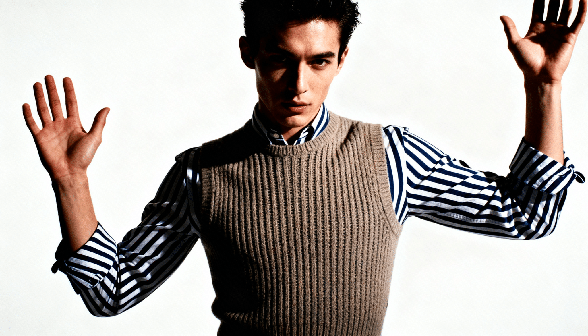 over a striped long sleeve shirt