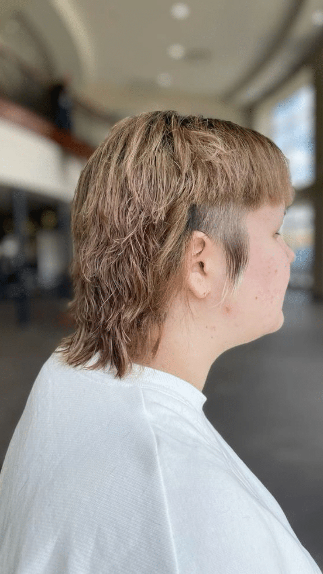 exposed sideburn mullet fade