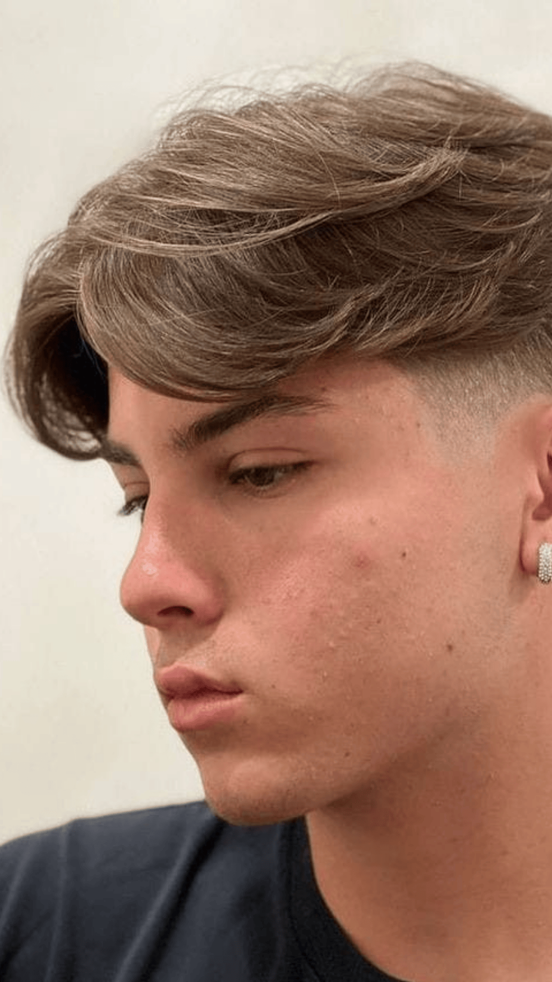 low taper fade middle part