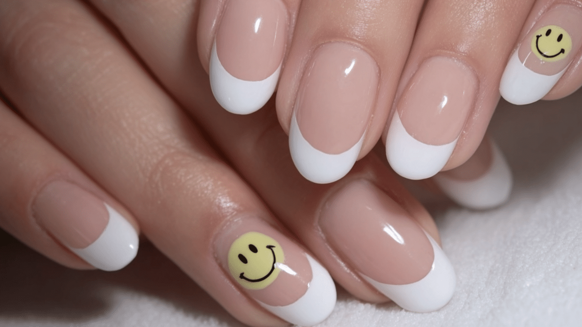 white french tips with smiley accent