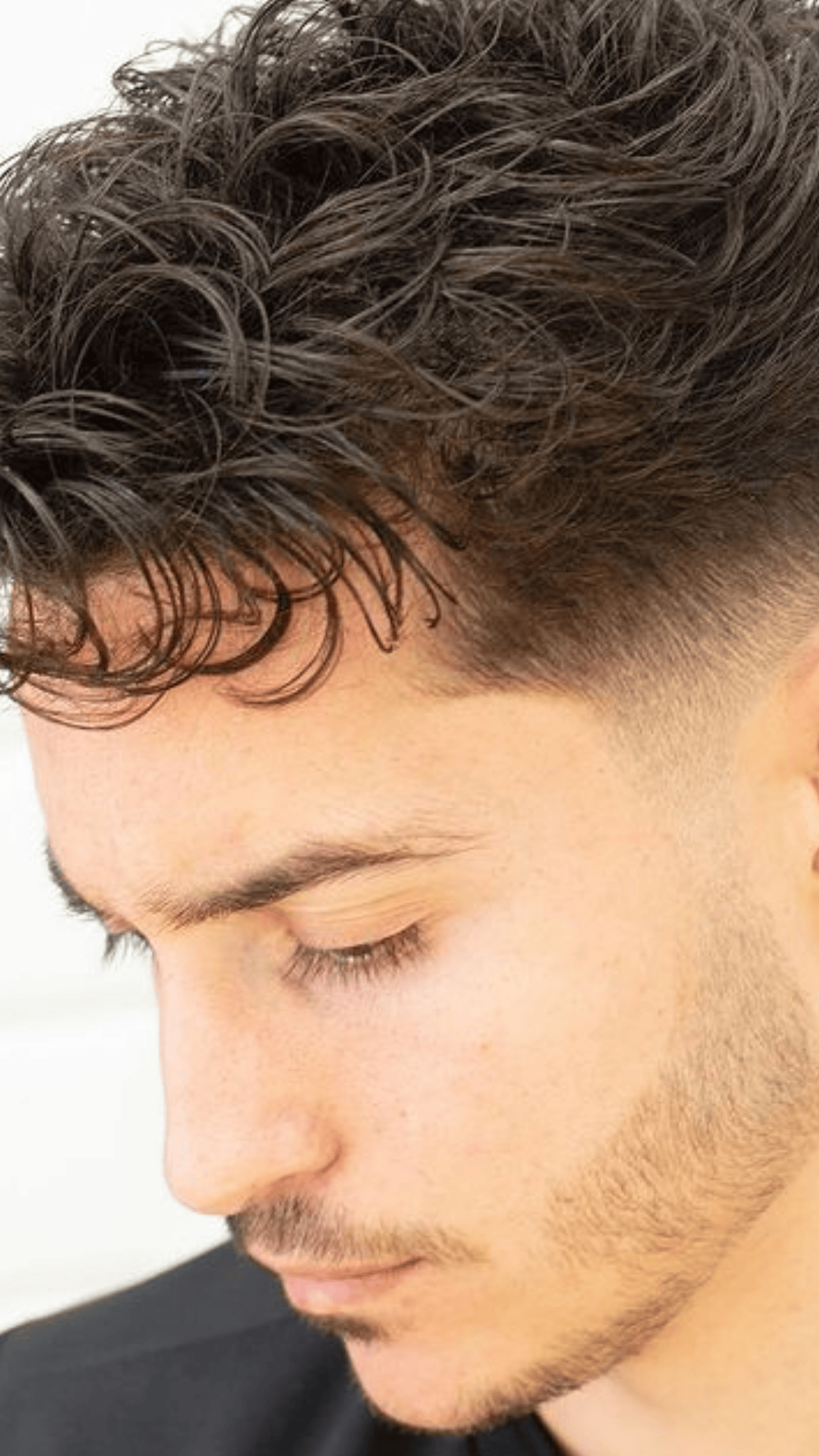 low fade curly top