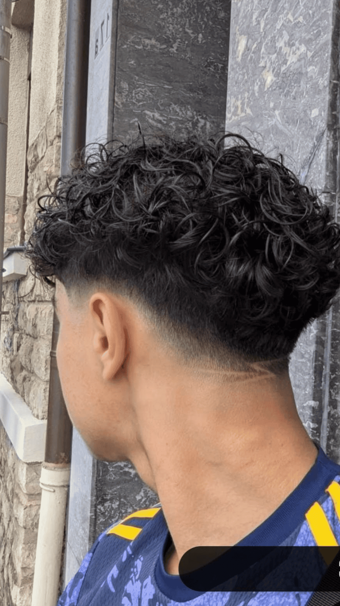 low fade with natural curls