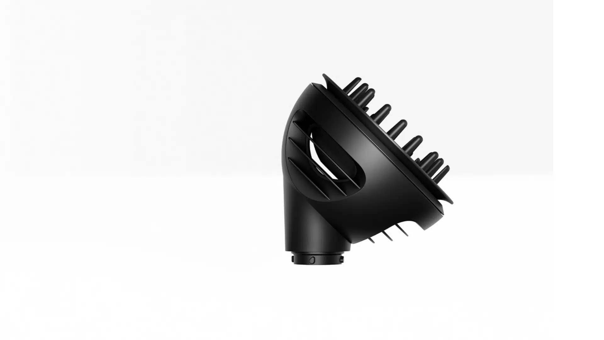 Black wave and curl diffuser attachment shown from the side.