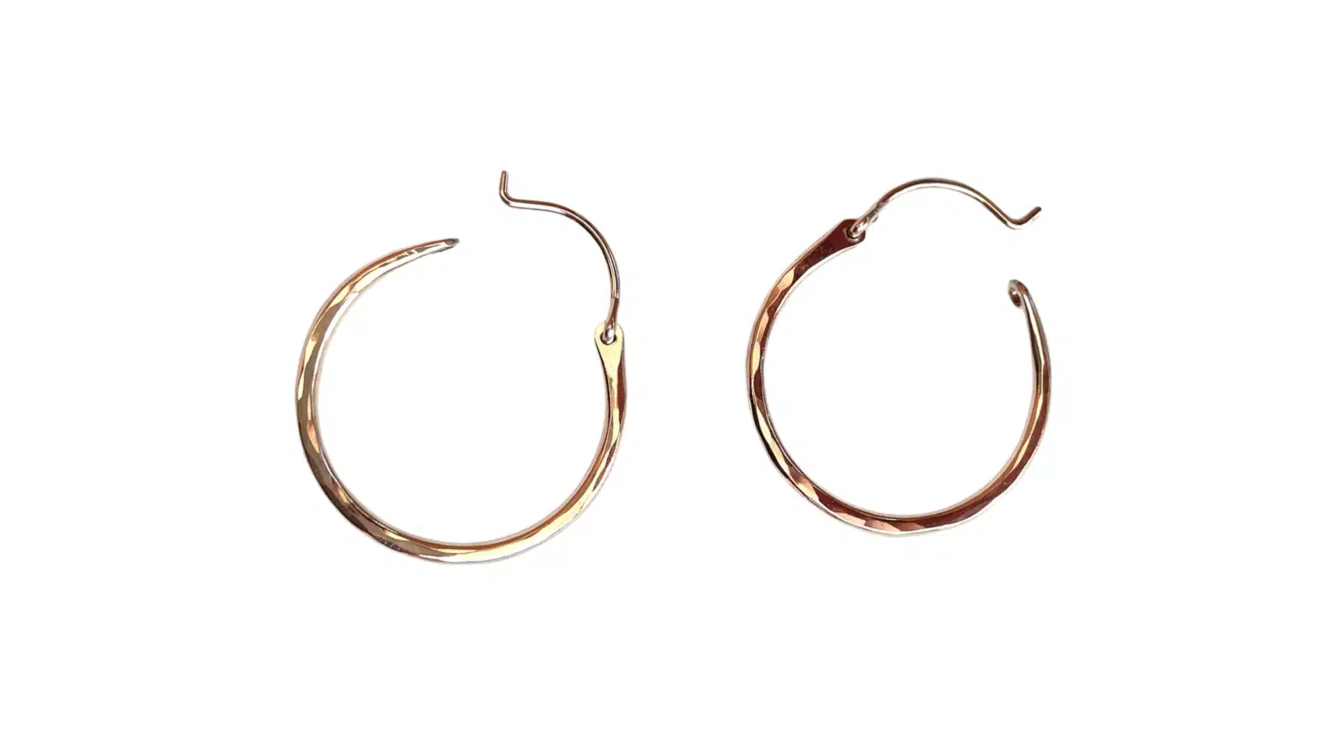 Gold hinged latch back hoop earrings with secure snap closure displayed on a white background showcasing durable comfortable earring backing for everyday wear