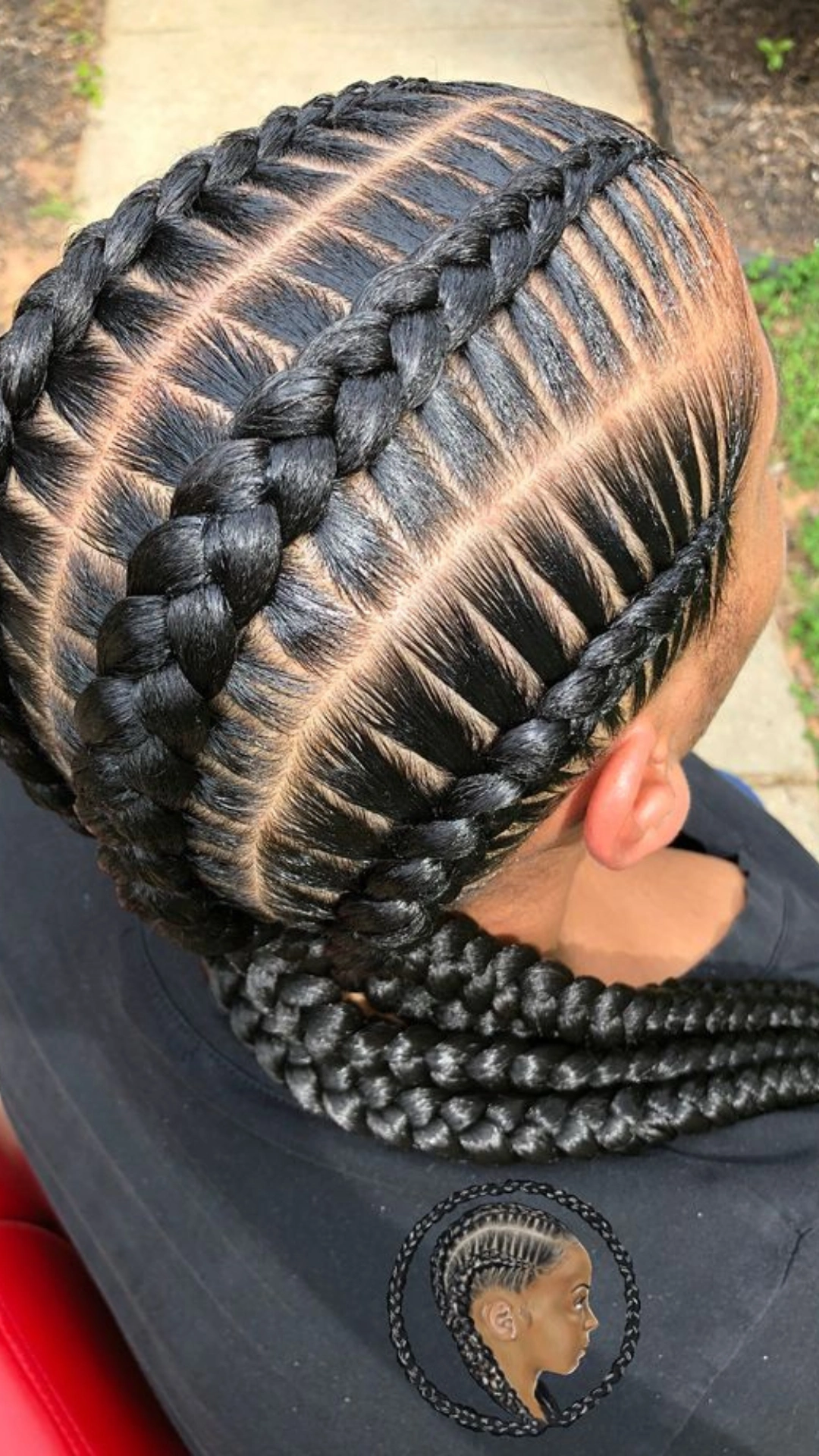 Stitch braid pattern styled into thick braids at the back of the head