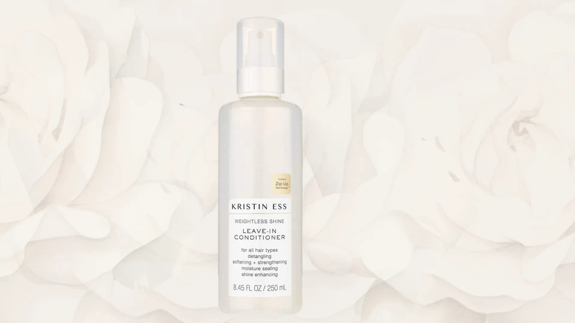 kristin ess leave in conditioner for curly hair on a floral background