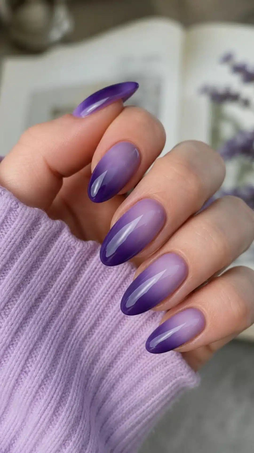 Lilac to deep violet ombre on almond nails