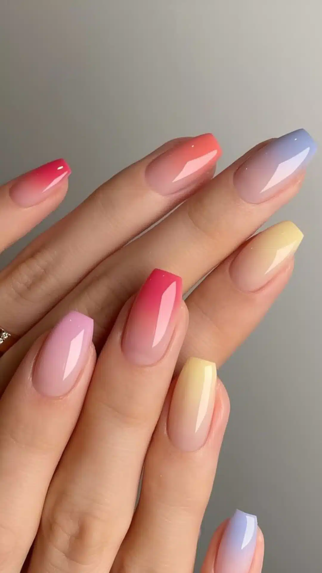 Multi-color ombre manicure with a different color fade on each nail