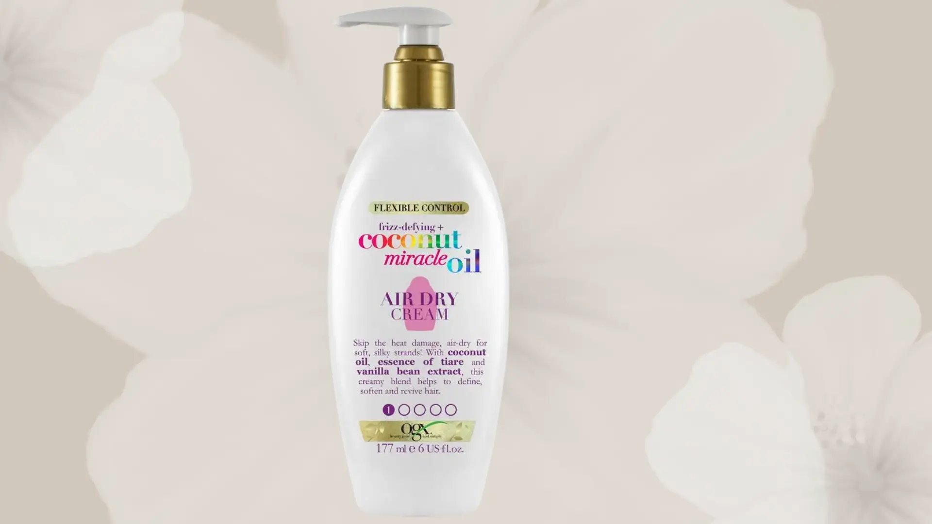 ogx conditioner bottle, white bottle, leave in conditioner with white floral background.